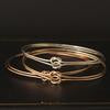 Lovers Knot Bracelet by Erica Weiner
